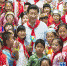 2013年5月29日，习近平在北京市少年宫参加“快乐童年 放飞希望”主题队日活动。新华社记者李学仁摄 - 广播电视