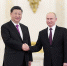 6月5日，国家主席习近平在莫斯科克里姆林宫同俄罗斯总统普京会谈。这是会谈前，两国元首紧紧握手，合影留念。 新华社记者 丁海涛 摄 - 广播电视