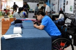 省残联党组成员、副理事长李俊温看望我省残疾人射击射箭队 - 残疾人联合会