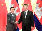 2月5日，国家主席习近平在北京人民大会堂会见柬埔寨首相洪森。 - 广播电视