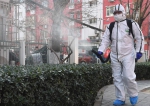 1月29日，北京市海淀区学院路街道聘请专业工作人员对社区内的重点区域进行卫生消毒。 - 广播电视